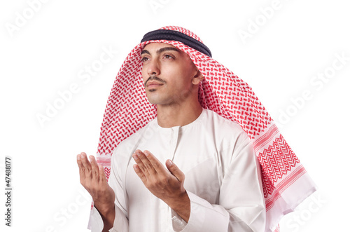 Photo: Arab man praying on white Arab man praying on white