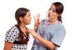 Pretty Hispanic Girl and Female Doctor Isolated