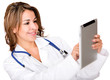 Doctor using a tablet computer
