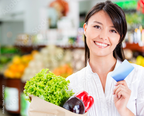 Photo: Shopping woman with credit card Shopping woman with credit card
