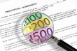 prenuptial agreement, magnifying glass and euro notes