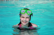 Photo: Happy Child in a Swimming Pool Happy Child in a Swimming Pool