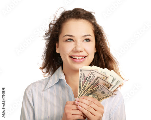 Photo: Beautiful success businesswoman holding dollar Beautiful success businesswoman holding dollar