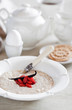 Oat bran porridge with vanilla and goji berries. Selective focus