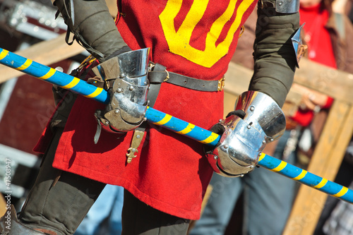 Photo: Armoured knight hands holds spear Armoured knight hands holds spear