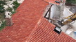 Demolition of old house with excavator