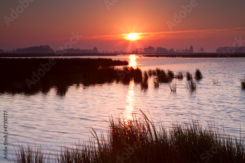 Photo: sunrise over lake in Groningen sunrise over lake in Groningen