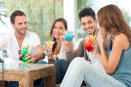 Photo: Happy Group Of Friends Drinking Juice Happy Group Of Friends Drinking Juice