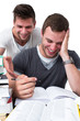Photo: Two young men studying together Two young men studying together
