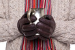 Man holding mug of warm drink