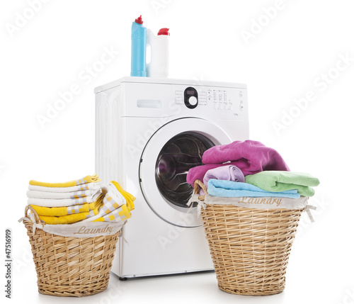 Photo: Laundry baskets and washing machine Laundry baskets and washing machine
