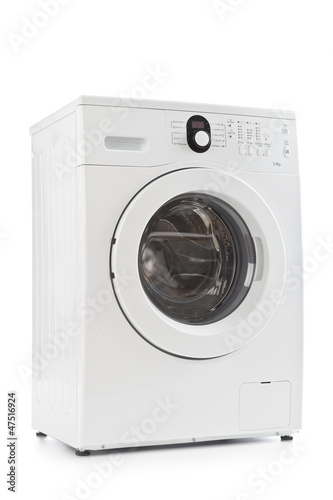 Photo: A washing machine isolated on white background A washing machine isolated on white background