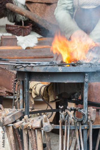 Photo: Schmied bei der Arbeit Schmied bei der Arbeit