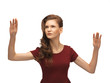 teenage girl working with something imaginary