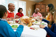 Multi Generation Family Celebrating With Christmas Meal