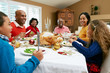 Multi Generation Family Celebrating With Christmas Meal