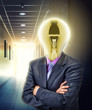 Businessman with glowing bulb instead of the head