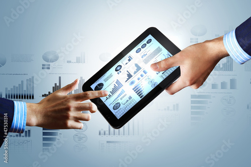 Photo: Modern computer technology in business Modern computer technology in business