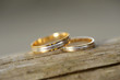 Golden rings on Wooden Surface