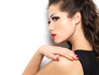 Beautiul fashion model with red manicure and lips