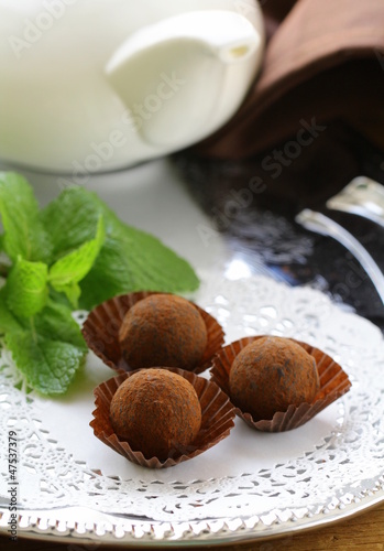 Photo: chocolate candy truffle with fresh mint chocolate candy truffle with fresh mint