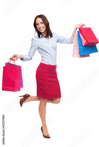 Photo: Happy woman with shopping bags Happy woman with shopping bags