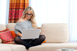 attractive woman with laptop in home