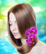 Photo: Woman with orchids in her gorgeous hair Woman with orchids in her gorgeous hair