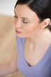 Portrait of beautiful young woman doing yoga exercise - Meditati