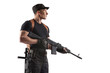 Police officer is holding Kalashnikov