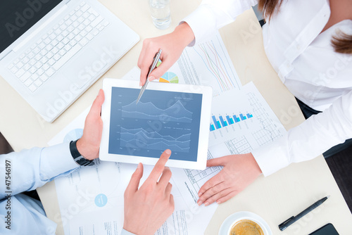 Photo: Analyzing financial chart Analyzing financial chart