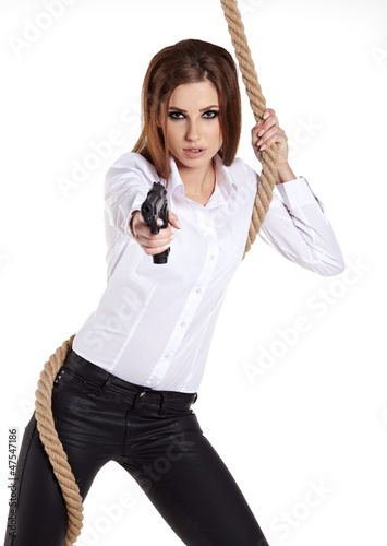 Photo: Sexy girl holding a black gun Sexy girl holding a black gun