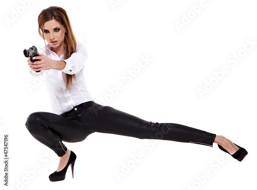 Photo: Sexy girl holding a black gun Sexy girl holding a black gun