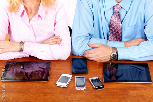 Photo: Business people group working with laptop. Business people group working with laptop.