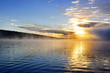 Sunrise on foggy lake
