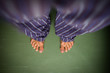 Alone in the house: man in pyjamas looking down on his bare feet