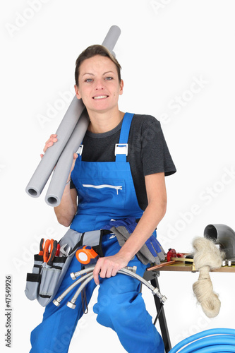 Photo: plumber woman with tools plumber woman with tools