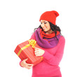 A young woman in warm red clothes holding a present
