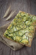 Sliced pizza with zucchini