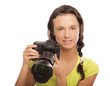 Beautiful young woman with camera.Isolated on white background
