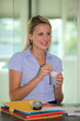 A businesswoman taking a coffee break.