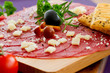 Carpaccio with olives and parmesan
