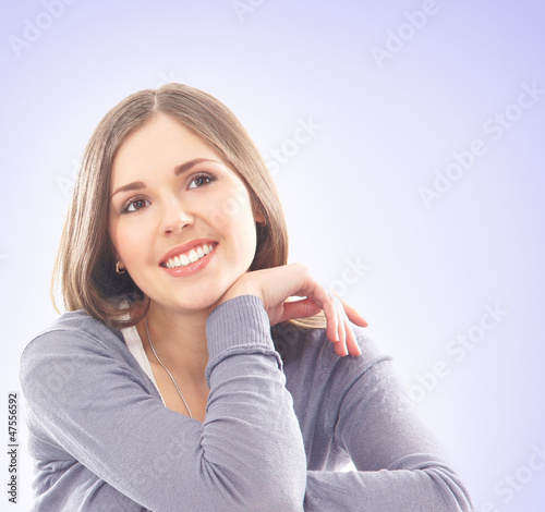 Photo: Portrait of a young and happy brunette Caucasian woman Portrait of a young and happy brunette Caucasian woman
