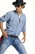 Photo: young man wearing cowboy posing young man wearing cowboy posing