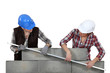 duo of female bricklayers
