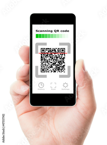 Photo: Smartphone in hand scanning QR code Smartphone in hand scanning QR code