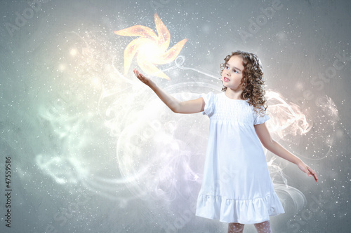 Photo: Child with magic light Child with magic light