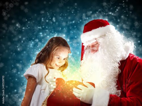 Photo: portrait of santa claus with a girl portrait of santa claus with a girl