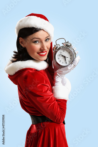 Photo: christmas girl in santa hat christmas girl in santa hat
