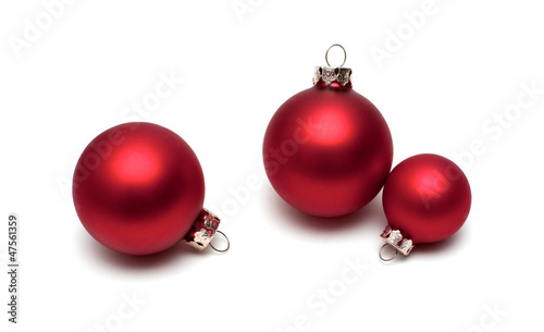 Photo: Red christmas balls on white background. Red christmas balls on white background.